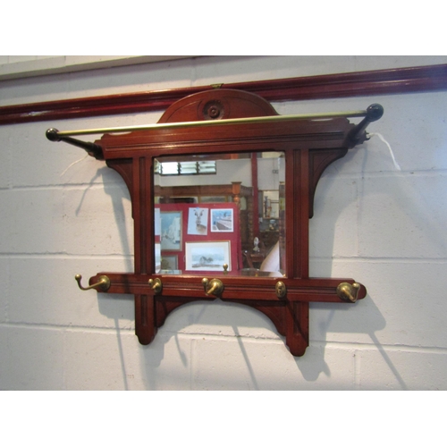 1017 - An Edwardan mirrored coat rack