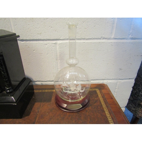 1018 - A Lichfield glass sculpture 'Mayflower' in a bottle, 31cm tall    (E) £10-20