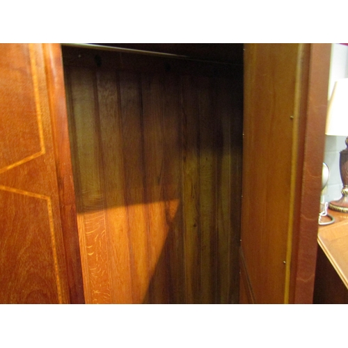 1041 - An Edwardian mirrored door wardrobe with under drawer. 201cm x 128cm x 49cm    (R) £30