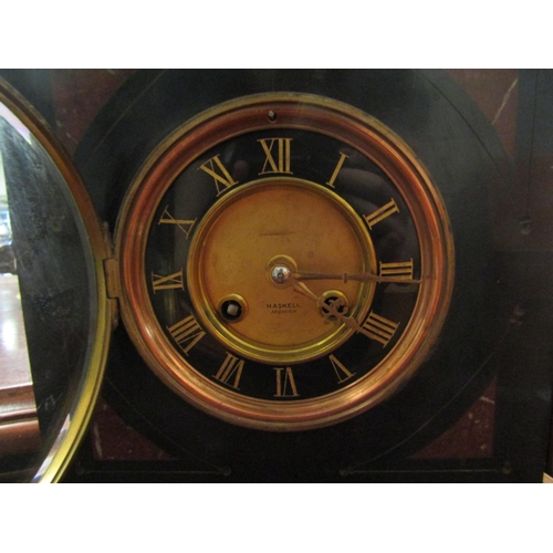 1123 - A Haskell of Ipswich slate and marble mantel clock    (R) £25