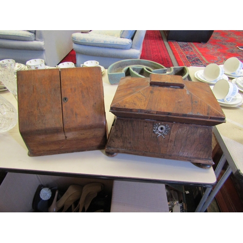 1160 - A 19th Century sarcophagus shape tea caddy with glass bowl and lidded compartment and a desk tidy, b... 