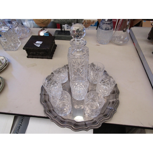 1168 - A crystal glass decanter and seven glasses on a plated tray