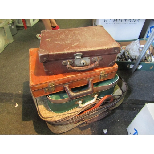 1186 - A leather briefcase, two bags and four cases including AER Lingus