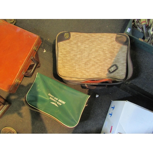 1186 - A leather briefcase, two bags and four cases including AER Lingus