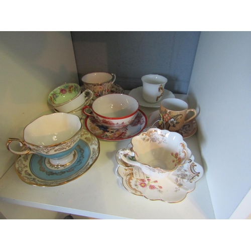 1230 - A selection of cabinet cups and saucers including Royal Albert 