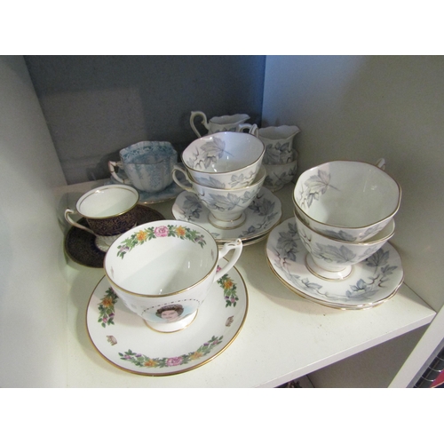 1230 - A selection of cabinet cups and saucers including Royal Albert 