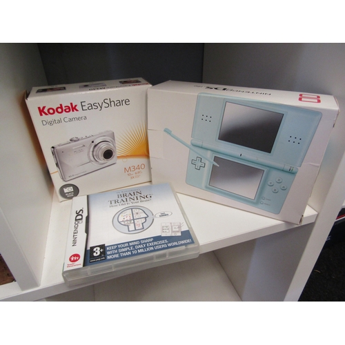 1253 - A Nintendo DS lite with Brain Training game together with a Kodak Easyshare digital camera