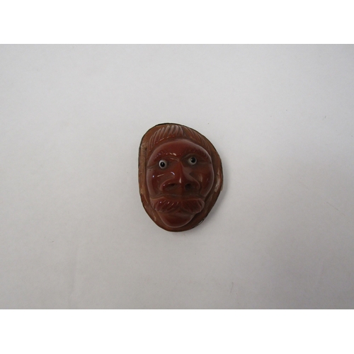 1259 - A Late 19th/early 20th Century African carved nut viniagrette in the form of a man's head   (R) £50