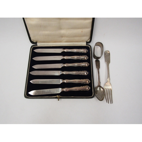 1264 - A cased set of silver handled knives and associated silver fork, teaspoon and napkin ring  (R) £35