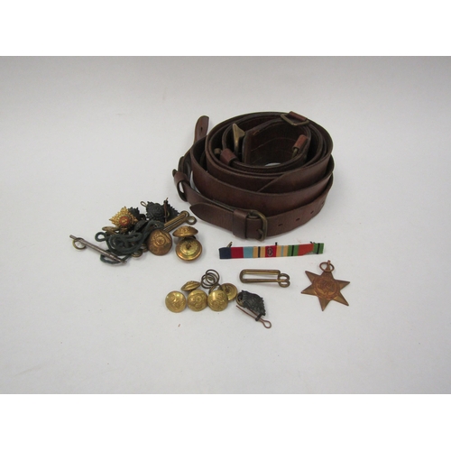 1301 - A WWII Sam Browne belt together with Africa Star medal, bar with 8th Army numbering and various badg... 