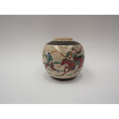 1310 - A Japanese crackle glaze ginger jar depicting warrior on horseback, bulbous form, character marks to... 