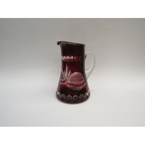 1319 - A cut glass ruby overlaid jug, 23cm tall   (E) £10-15