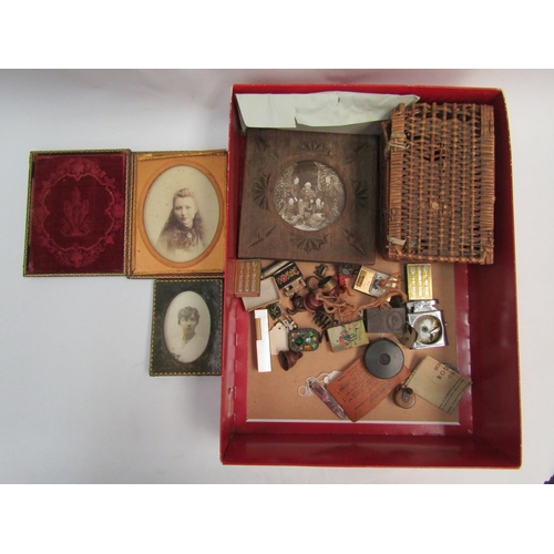 1333 - A collection of bijouterie; miniature treen tape measure, old photos, wax seal in wooden box, miniat... 