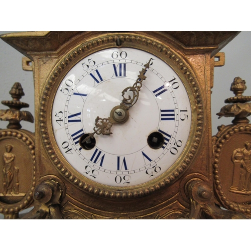 1337 - A late 19th Century French gilt ormolu mantel clock with Roman numeral hours and Arabic minutes. The... 