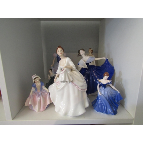 1354 - Seven Royal Doulton figures including four larger, Charlotte, Carol, Elaine and Nancy, and three min... 