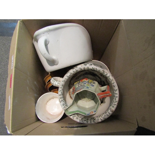 1438 - A box containing various china including chamber pots, jugs, retro storage jars etc.   (E)  £10-20