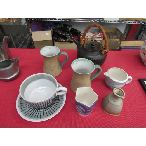 1450 - A selection of Studio pottery including a Leach standard ware teapot