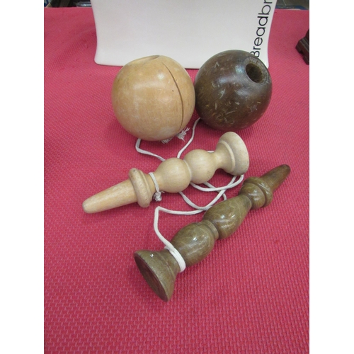 1464 - Two wooden stick and ball games   (R)  £20