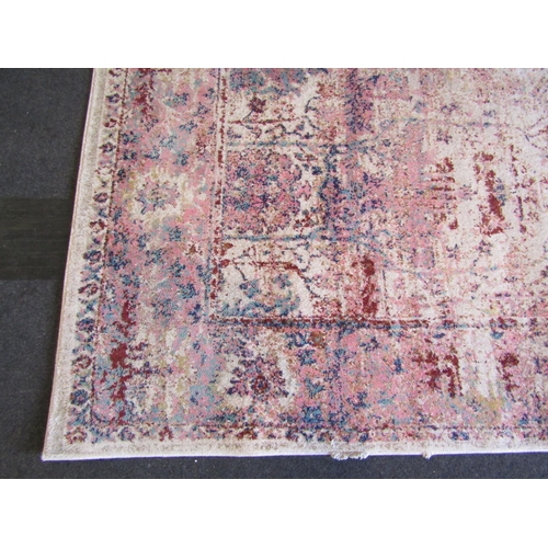 1488 - A Next polyester and polypropylene cream ground rug, 290cm x 200cm