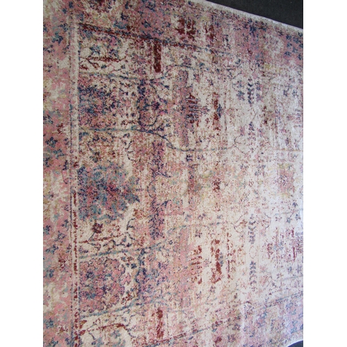 1488 - A Next polyester and polypropylene cream ground rug, 290cm x 200cm