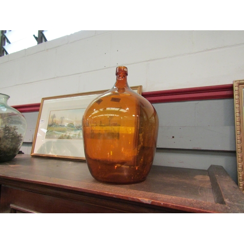 1066 - Two glass carboys including amber coloured example