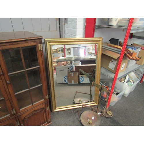 1191 - A modern gilt framed wall mirror, 105cm x 75cm total