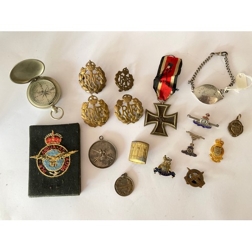 5369 - A collection of militaria including George crown RAF cap badges, Royal Artillery sweetheart badge, h... 