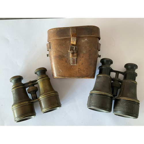 5053 - Two pairs of WWII binoculars by Bausch & Lomb and Taylor-Hobson, two WWI era examples, together with... 