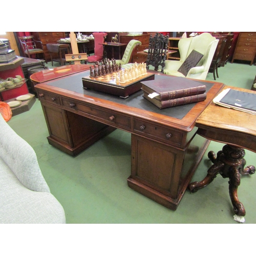 4101 - Circa 1860 a mahogany twin pedestal partners desk of twelve drawers and two single door cupboards on... 