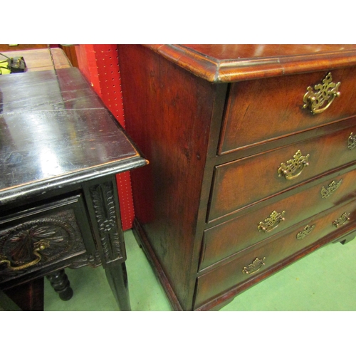 4114 - A George III flame mahogany chest of four graduating drawers with pierced brass back plate and swan ... 