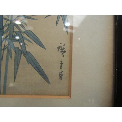 4121 - Two Japanese silk pictures depicting birds in flight, framed and glazed, 28cm x 10cm each