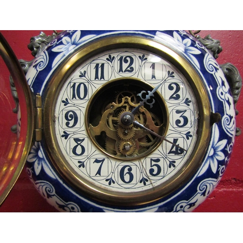 4122 - A French hanging wall clock by Eugene Farcot, ca. 1890. Circular porcelain case with blue decoration... 