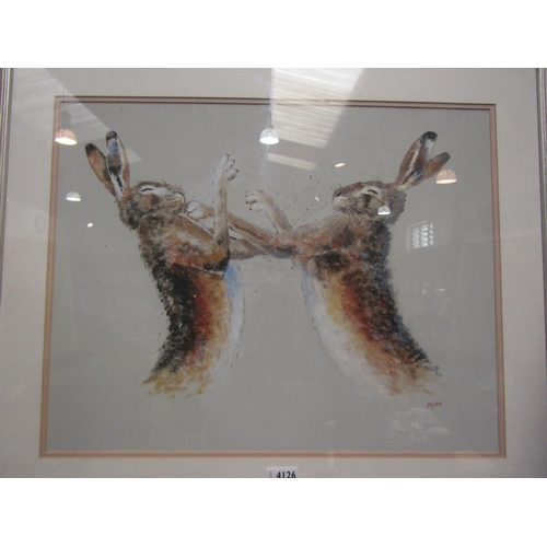 4126 - JOHN RYAN: An acrylic of boxing hares, signed lower right, framed and glazed, 44cm x 56cm