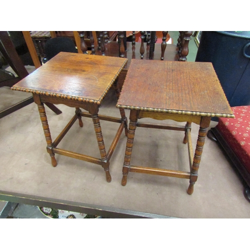 4208 - A pair of small oak side tables with beaded edging and bobbin turned supports, 39cm tall