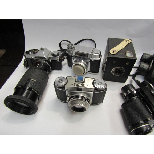 4401 - A quantity of cameras and binoculars incl Olympus OM20 SLR camera and Barr and Stroud CF41 naval bin... 