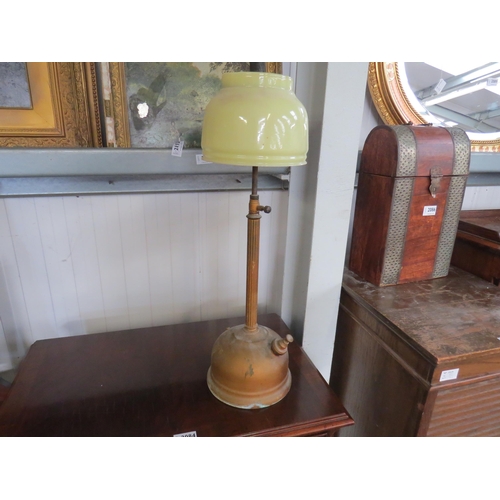 2074 - A parrafin lamp with glass shade