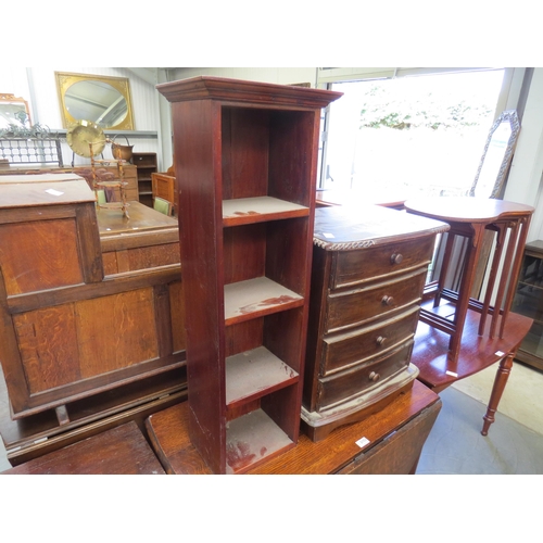 2200 - A reproduction bedside unit of four drawers and a small bookcase