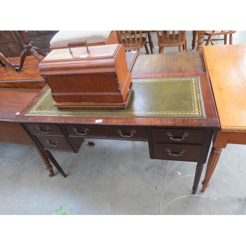 2222 - A Regency style five drawer desk, green leather tooled top