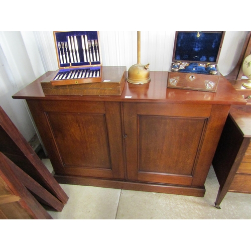 2076 - A polished Victorian  mahogany two door cupboard     (R) £120