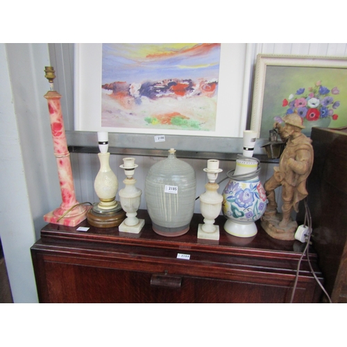 2185 - Seven various lamps including Poole pottery   (E) £20-30