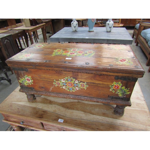 2211 - An Indian hardwood blanket box on legs, iron work and floral painted