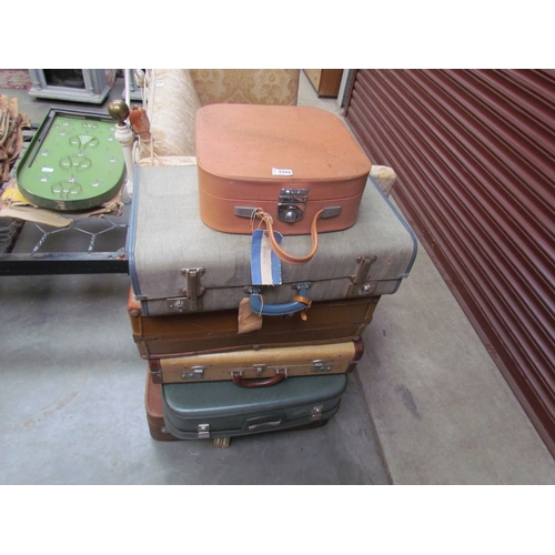 2396 - Six mid 20th Century suitcases