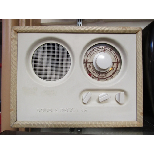 7003 - A Double Decca 46 valve radio housed in an embossed fabric covered plywood case with cream coloured ... 