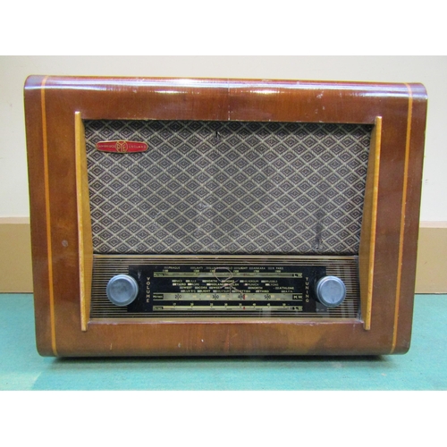 7029 - A Pye model P75 AC mains operated table top valve radio housed in walnut veneered case, serial numbe... 
