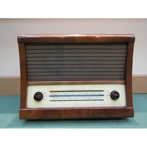 7036 - A Ferguson model 356A four valve table top radio in walnut veneered wooden case with sloping front, ... 