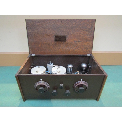 7039 - A Cossor 'Melody Maker' model 234 battery TRF kit valve radio in oak case, serial number 104488. C.1... 