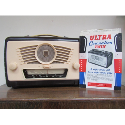 7049 - An Ultra R786 Coronation Twin portable valve radio housed in a dark plum and cream Bakelite and plas... 