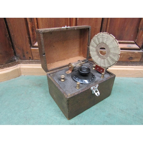 7051 - A 1920's crystal radio receiver set in hinged rectangular case with aerial and coil