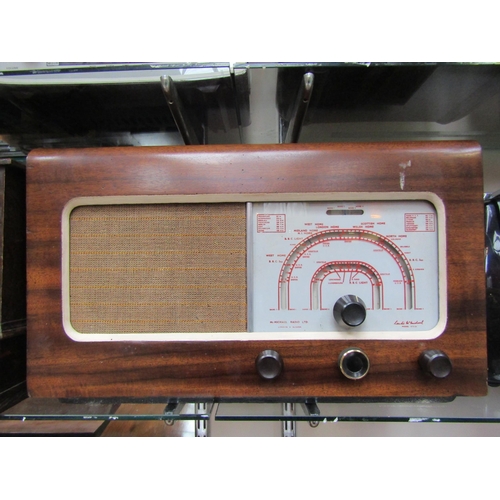 7057 - A McMichael model 471U five valve table top radio in walnut veneered wooden case, serial number 3891... 