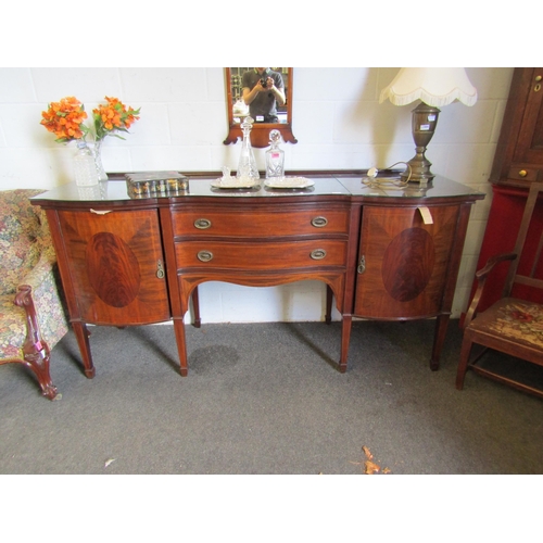 1016 - An Edwardian crossbanded mahogany serpentine fronted sideboard in the 18th Century style (back struc... 